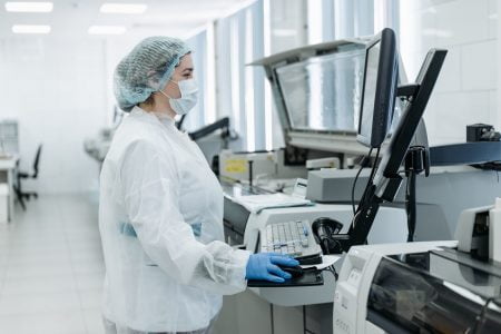 Woman is using computer in lab