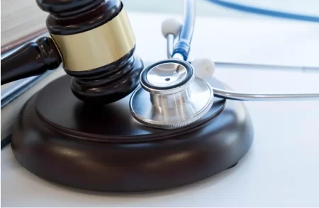 A gavel and a stethoscope