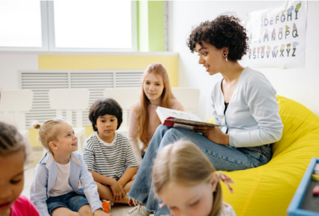 Parent and young child interacting to support early communication development