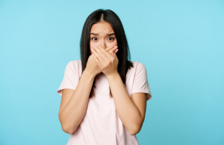 The Sunday Problem: When Something Feels Wrong in Your Mouth and Everything Is Closed Person holding jaw in pain at home during a dental emergency, searching for a Sunday dentist for urgent care.
