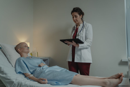 Why More People Are Choosing Patient-Focused Care Models Doctor having a detailed and personalized consultation with a patient in a modern patient-centered healthcare setting.