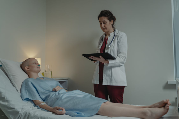 Doctor having a detailed and personalized consultation with a patient in a modern patient-centered healthcare setting.
