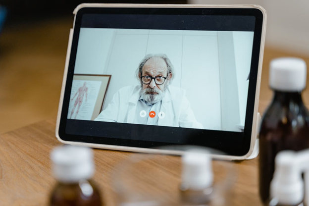 People using online forums and social media to discuss health issues and support each other in digital health communities.