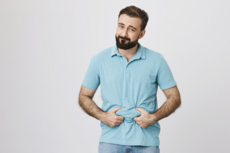 The Emotional Weight of Weight Loss: What GLP-1 Medications Are Teaching Us About the Mind-Body Connection Patient measuring weight loss effects and emotional health during GLP-1 treatment consultation.