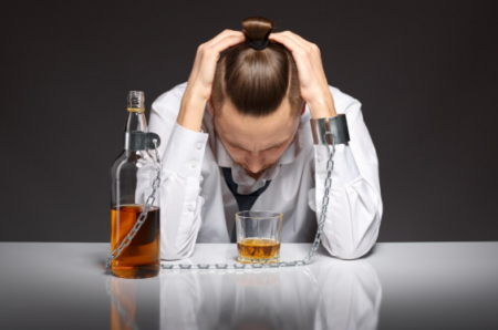 Person in a medical detox facility receiving support during alcohol withdrawal and recovery treatment