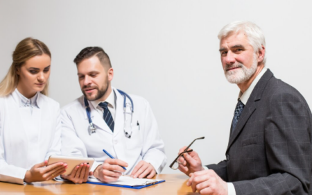 What Qualifies As Medical Malpractice In A Legal Case? Medical malpractice attorney reviewing hospital records and legal documents related to a patient injury claim