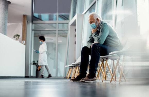 Reviewing medical records with concerned patient discussing possible medical malpractice or healthcare negligence