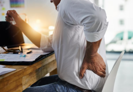 When Does a Work Back Injury Qualify for Permanent Disability Benefits in South Carolina? Worker with lower back injury disability paperwork
